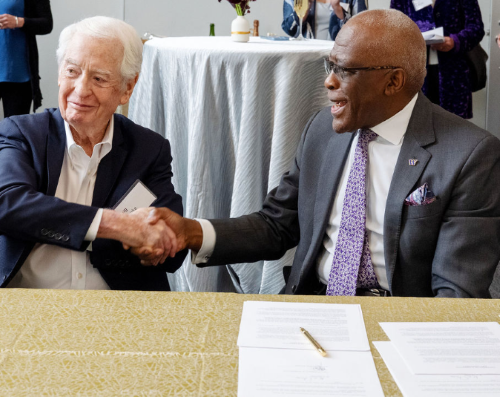 Franke and President Jones WWAMI gift signing