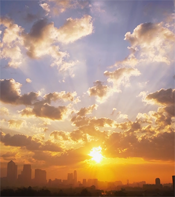 picture of a sunrise sky with orange and blue hues