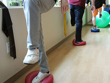 picture of feet balancing on balls