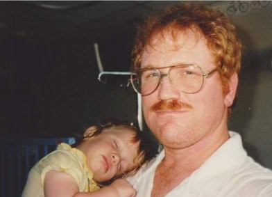 Jamie Wright with her dad James after her first surgery in1989
