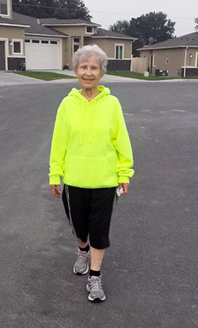 picture of patient Myra Gaines walking in her Kennewick, Washington, neighborhood