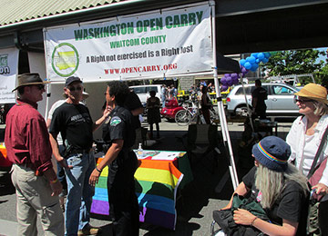 an open-carry booth at a gay-pride festival in Bellingham, Washington
