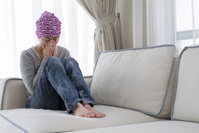 picture of woman sitting on sofa