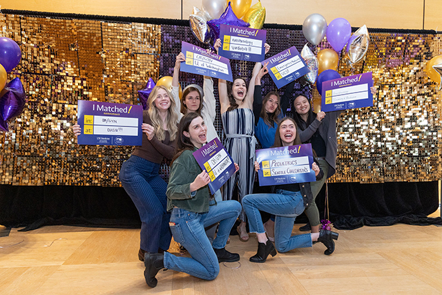 picture of happily matched med-school students