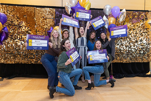 picture of happily matched med-school students 