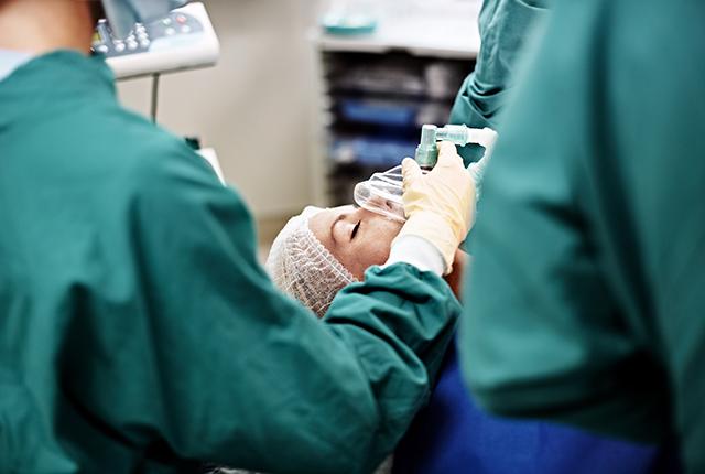 picture of female patient receiving anesthesia in surgery
