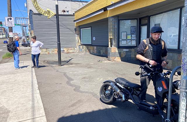 picture of patient Michael Carpenter mounting his motorcycle after an appointment in north Seattle