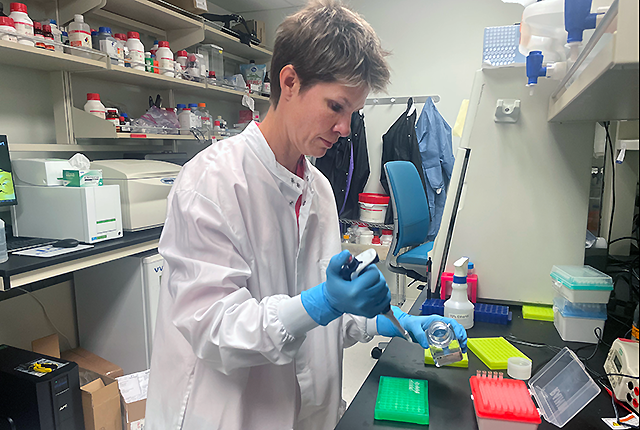 picture of scientist Nicole Lieberman in a lab at UW Medicine in Seattle