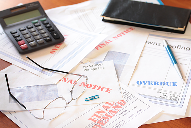 picture of a pile of unpaid bills