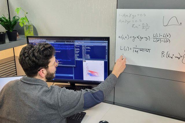 Alexander Robertson creating statistical models of microbial dynamics