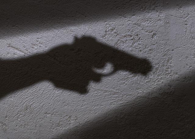 Media Name: gun_shadow_gettyimages-871380072.jpg