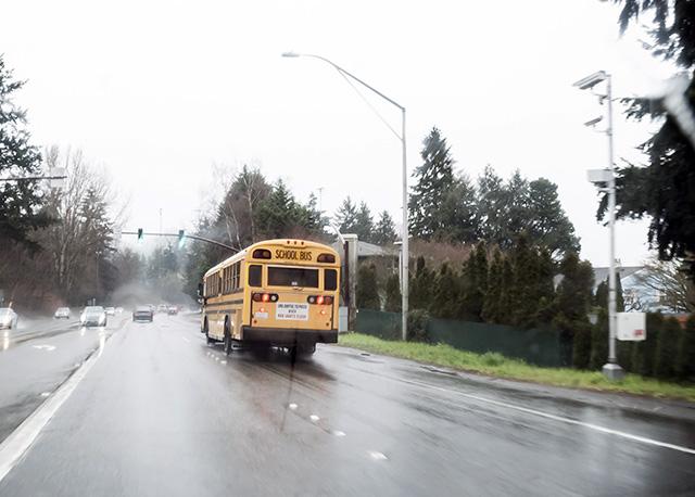 Media Name: school_bus_on_street_speeding_school_zone_gettyimages-666895056_cropped.jpg